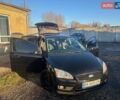 Черный Форд Фокус, объемом двигателя 1.6 л и пробегом 156 тыс. км за 5200 $, фото 1 на Automoto.ua