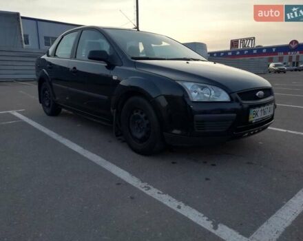Черный Форд Фокус, объемом двигателя 1.4 л и пробегом 31 тыс. км за 6000 $, фото 6 на Automoto.ua