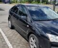 Черный Форд Фокус, объемом двигателя 1.6 л и пробегом 230 тыс. км за 4607 $, фото 1 на Automoto.ua