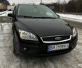 Чорний Форд Фокус, об'ємом двигуна 2 л та пробігом 241 тис. км за 4450 $, фото 1 на Automoto.ua