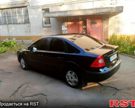 Черный Форд Фокус, объемом двигателя 2 л и пробегом 300 тыс. км за 3600 $, фото 1 на Automoto.ua