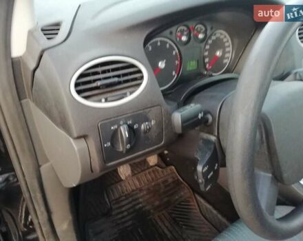 Черный Форд Фокус, объемом двигателя 1.4 л и пробегом 31 тыс. км за 6000 $, фото 15 на Automoto.ua