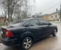 Черный Форд Фокус, объемом двигателя 1.6 л и пробегом 297 тыс. км за 3950 $, фото 2 на Automoto.ua