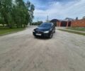 Черный Форд Фокус, объемом двигателя 1.6 л и пробегом 330 тыс. км за 4700 $, фото 1 на Automoto.ua