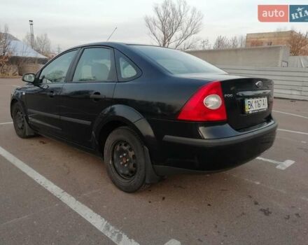 Черный Форд Фокус, объемом двигателя 1.4 л и пробегом 31 тыс. км за 6000 $, фото 2 на Automoto.ua