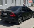 Черный Форд Фокус, объемом двигателя 1.6 л и пробегом 328 тыс. км за 4999 $, фото 3 на Automoto.ua