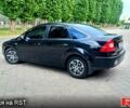 Черный Форд Фокус, объемом двигателя 1.6 л и пробегом 159 тыс. км за 5500 $, фото 1 на Automoto.ua