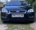 Чорний Форд Фокус, об'ємом двигуна 2 л та пробігом 226 тис. км за 5800 $, фото 1 на Automoto.ua