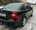 Чорний Форд Фокус, об'ємом двигуна 2 л та пробігом 241 тис. км за 4450 $, фото 2 на Automoto.ua