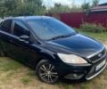 Черный Форд Фокус, объемом двигателя 1.8 л и пробегом 300 тыс. км за 4999 $, фото 1 на Automoto.ua