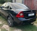 Черный Форд Фокус, объемом двигателя 1.8 л и пробегом 300 тыс. км за 4999 $, фото 4 на Automoto.ua