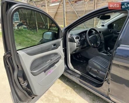 Черный Форд Фокус, объемом двигателя 1.6 л и пробегом 246 тыс. км за 4900 $, фото 12 на Automoto.ua