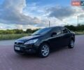 Черный Форд Фокус, объемом двигателя 1.6 л и пробегом 300 тыс. км за 5300 $, фото 1 на Automoto.ua