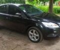 Черный Форд Фокус, объемом двигателя 1.6 л и пробегом 116 тыс. км за 5000 $, фото 2 на Automoto.ua