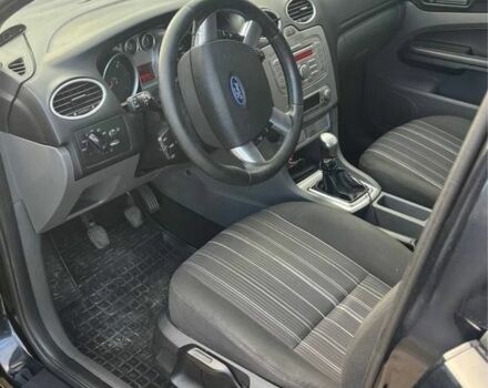 Черный Форд Фокус, объемом двигателя 1.8 л и пробегом 300 тыс. км за 4999 $, фото 6 на Automoto.ua