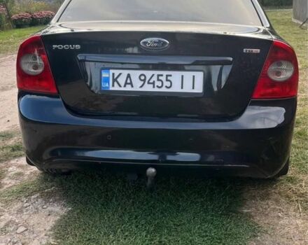 Черный Форд Фокус, объемом двигателя 1.8 л и пробегом 300 тыс. км за 4999 $, фото 5 на Automoto.ua