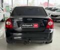 Черный Форд Фокус, объемом двигателя 1.6 л и пробегом 145 тыс. км за 5590 $, фото 5 на Automoto.ua