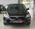 Черный Форд Фокус, объемом двигателя 1.6 л и пробегом 145 тыс. км за 5590 $, фото 1 на Automoto.ua
