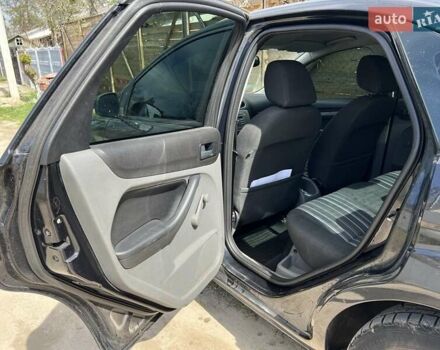 Черный Форд Фокус, объемом двигателя 1.6 л и пробегом 246 тыс. км за 4900 $, фото 5 на Automoto.ua