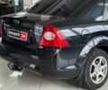 Черный Форд Фокус, объемом двигателя 1.6 л и пробегом 145 тыс. км за 5590 $, фото 8 на Automoto.ua