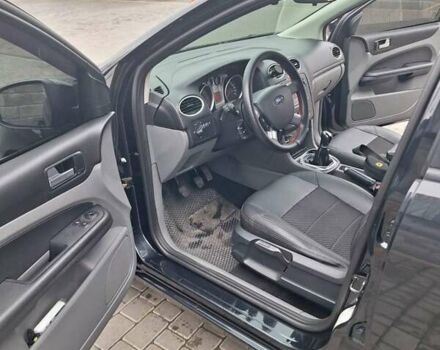 Черный Форд Фокус, объемом двигателя 1.8 л и пробегом 220 тыс. км за 5999 $, фото 6 на Automoto.ua