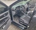 Черный Форд Фокус, объемом двигателя 1.8 л и пробегом 220 тыс. км за 5999 $, фото 6 на Automoto.ua