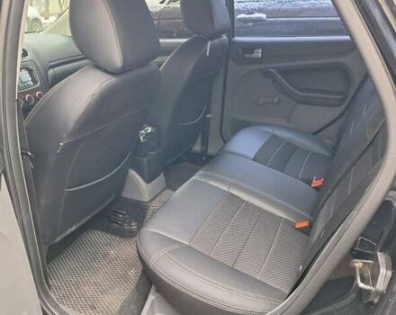 Черный Форд Фокус, объемом двигателя 1.8 л и пробегом 220 тыс. км за 5999 $, фото 10 на Automoto.ua