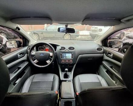 Черный Форд Фокус, объемом двигателя 1.8 л и пробегом 220 тыс. км за 5999 $, фото 11 на Automoto.ua