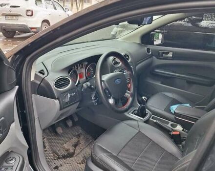 Черный Форд Фокус, объемом двигателя 1.8 л и пробегом 220 тыс. км за 5999 $, фото 13 на Automoto.ua