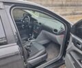 Черный Форд Фокус, объемом двигателя 1.8 л и пробегом 220 тыс. км за 5999 $, фото 5 на Automoto.ua