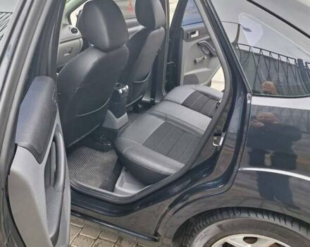 Черный Форд Фокус, объемом двигателя 1.8 л и пробегом 220 тыс. км за 5999 $, фото 1 на Automoto.ua