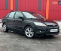Черный Форд Фокус, объемом двигателя 1.6 л и пробегом 207 тыс. км за 6490 $, фото 1 на Automoto.ua