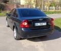 Черный Форд Фокус, объемом двигателя 1.6 л и пробегом 300 тыс. км за 4650 $, фото 4 на Automoto.ua