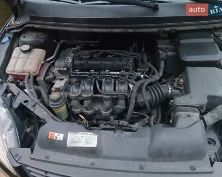 Черный Форд Фокус, объемом двигателя 1.6 л и пробегом 214 тыс. км за 5850 $, фото 2 на Automoto.ua