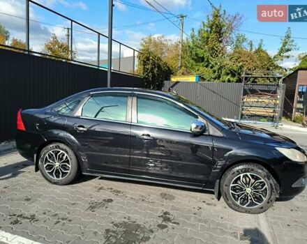 Черный Форд Фокус, объемом двигателя 1.6 л и пробегом 213 тыс. км за 5300 $, фото 6 на Automoto.ua