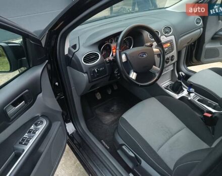 Черный Форд Фокус, объемом двигателя 1.6 л и пробегом 214 тыс. км за 5850 $, фото 4 на Automoto.ua