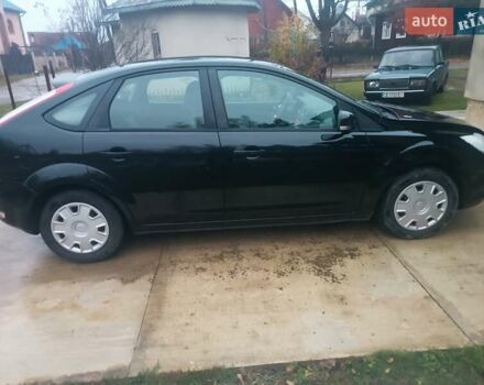 Черный Форд Фокус, объемом двигателя 1.6 л и пробегом 214 тыс. км за 5850 $, фото 13 на Automoto.ua