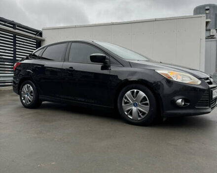 Чорний Форд Фокус, об'ємом двигуна 2 л та пробігом 347 тис. км за 5799 $, фото 4 на Automoto.ua