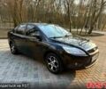 Черный Форд Фокус, объемом двигателя 1.6 л и пробегом 180 тыс. км за 5700 $, фото 1 на Automoto.ua