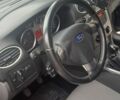 Черный Форд Фокус, объемом двигателя 1.6 л и пробегом 170 тыс. км за 6900 $, фото 1 на Automoto.ua