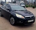 Черный Форд Фокус, объемом двигателя 1.6 л и пробегом 170 тыс. км за 7000 $, фото 1 на Automoto.ua