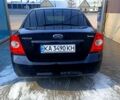 Черный Форд Фокус, объемом двигателя 1.6 л и пробегом 200 тыс. км за 5800 $, фото 4 на Automoto.ua