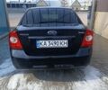 Черный Форд Фокус, объемом двигателя 1.6 л и пробегом 200 тыс. км за 5800 $, фото 3 на Automoto.ua