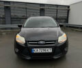 Чорний Форд Фокус, об'ємом двигуна 2 л та пробігом 347 тис. км за 5799 $, фото 1 на Automoto.ua