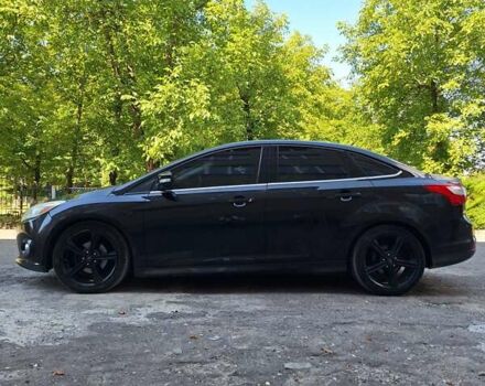 Чорний Форд Фокус, об'ємом двигуна 2 л та пробігом 182 тис. км за 7300 $, фото 2 на Automoto.ua