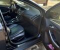 Черный Форд Фокус, объемом двигателя 2 л и пробегом 175 тыс. км за 7500 $, фото 1 на Automoto.ua