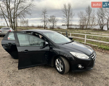 Черный Форд Фокус, объемом двигателя 2 л и пробегом 159 тыс. км за 7999 $, фото 2 на Automoto.ua