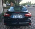 Чорний Форд Фокус, об'ємом двигуна 2 л та пробігом 253 тис. км за 6500 $, фото 5 на Automoto.ua
