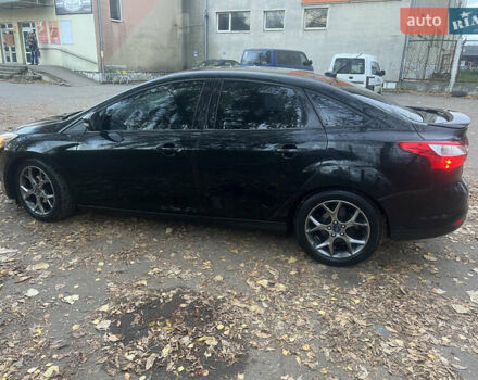 Чорний Форд Фокус, об'ємом двигуна 2 л та пробігом 163 тис. км за 7700 $, фото 4 на Automoto.ua