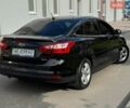 Черный Форд Фокус, объемом двигателя 1 л и пробегом 65 тыс. км за 6999 $, фото 3 на Automoto.ua